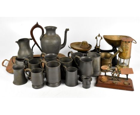 A collection of 19th century pewter wares and tankard, together with an Art Nouveau twin handled tray, length including handl