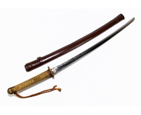 A Japanese ancestral Samerai Daito of the late Shinto period, in full Shingunto mounting, converted to military use during Wo