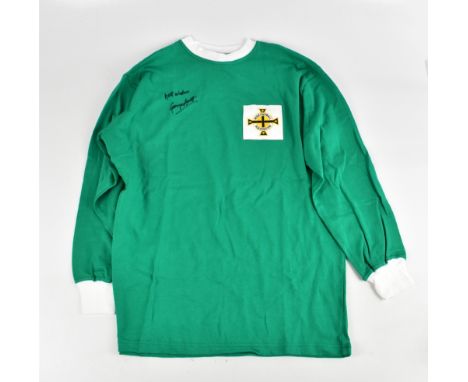 BEST; a Northern Ireland long sleeve football shirt, signed to the front, size XL.Additional InformationCreasing and light ge