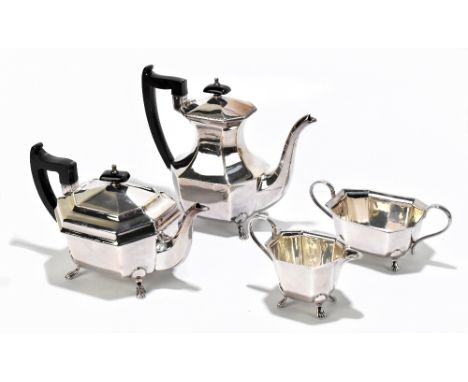 VINERS OF SHEFFIELD; a silver plated four piece tea service with panelled decoration, raised on paw feet (4).Additional Infor