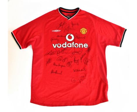MANCHESTER UNITED; a 2000 Umbro home shirt, signed by Barthez, Vernon, Keane, P. Neville, G Neville, Forlan, van Nistelrooy, 