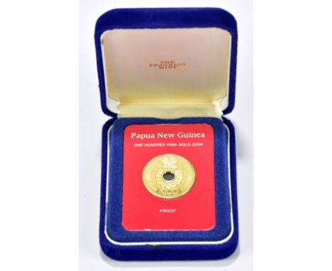 PAPUA NEW GUINEA; a 100 Kina gold coin, proof, 1976, slabbed.Additional InformationThe coin in slabbed and fitted in presenta