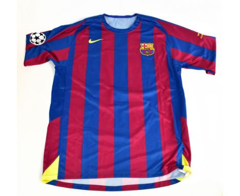 RONALDINHO; a Nike Barcelona home shirt, signed to the reverse, size XL.Additional InformationCreasing and light general, no 