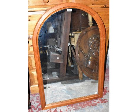A modern cherry wood wall mirror, with arched top, 106cm x 69cm.&nbsp;