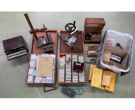 Watchmaker's bushing tool, watch mainsprings, wooden stand and a large selection of watchmaker's tools and accessories includ