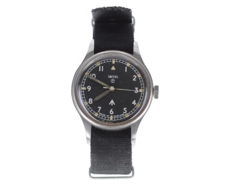 Smiths British Military Army issue stainless steel gentleman's wristwatch, circa 1966, circular black dial with Military arro