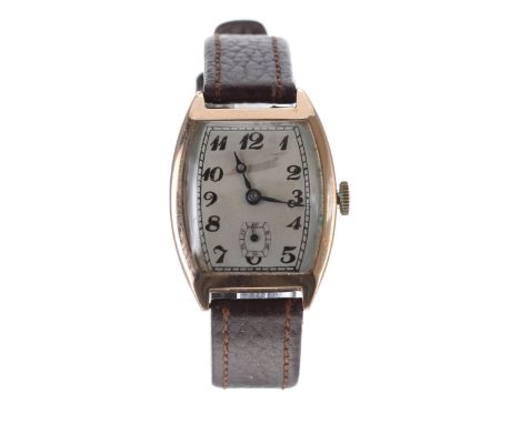 1920s 9ct tonneau cased gentleman's wristwatch, import hallmark for Glasgow 1928, silver dial with Arabic numerals and subsid