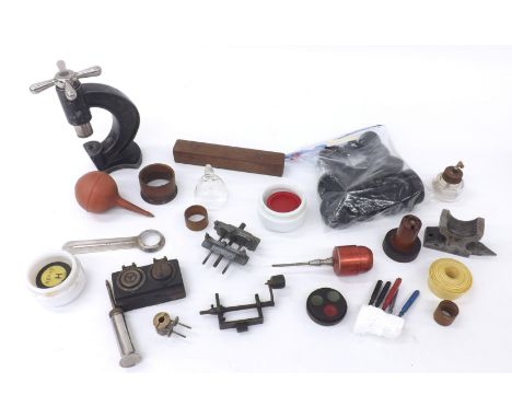 BMC glass pressing tool and accessories; together with two watch case opening tools, spring winding tool, jewellers anvil, qu