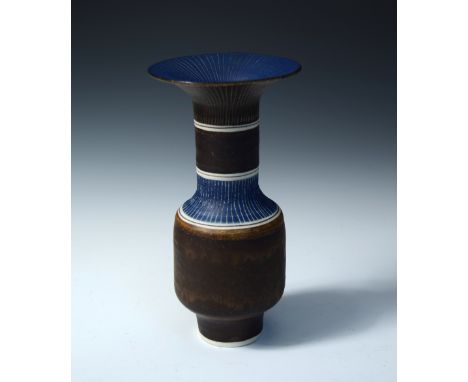 § Lucie Rie, (Austrian/British, 1902-1995), a fine porcelain vase with flared rim, with manganese glaze and sgraffito decorat