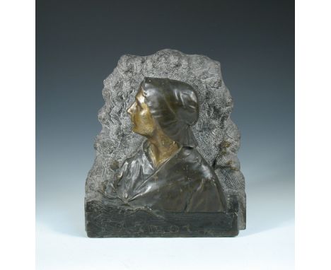 Constant Auguste Thomsen (French, 1869-1925), a bronze portrait bust entitled 'Amor', the female profile mounted to a slate b