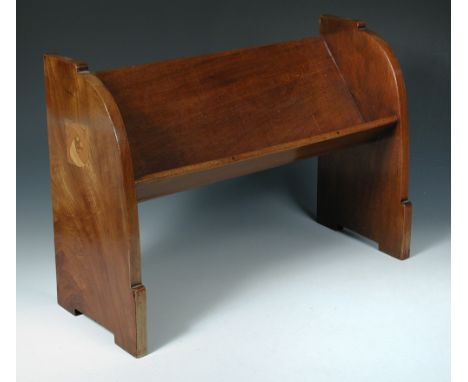 A Glasgow School mahogany book trough, the shaped end panels each with stylised foliate inlays 37 x 50½cm (14 x 20in)  