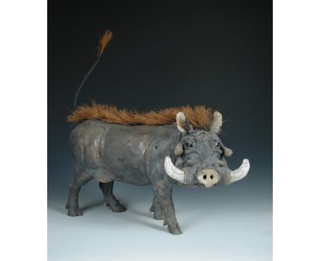§ Nick Mackman (British, 20th Century), Warthog, raku fired ceramic, modelled standing 49 x 54cm (19 x 21in)  