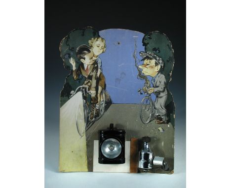 An early Miller bicycle lamp advertising card, the board designed by Mills depicting a couple riding a bicycle with a Miller 