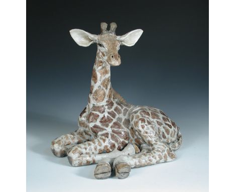 § Nick Mackman (British, 20th Century), Giraffe, raku fired ceramic, modelled lying down 38 x 33cm (15 x 13in) Other Notes: N