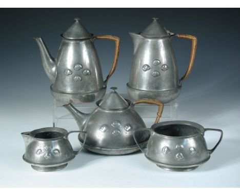 A Liberty & Co. Tudric pewter five piece tea set and coffee service, no. 0303, comprising teapot, coffee pot, hot water jug, 