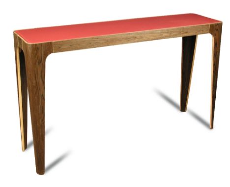 A contemporary bent plywood and pink glass console table, the rounded rectangular top on tapering shaped legs 82 x 135 x 35cm