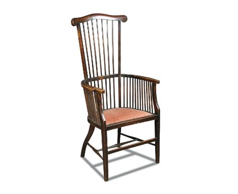 Liberty & Co., a stick back elbow chair, the stained frame with a padded seat raised on tapering legs 124 x 60cm (48 x 23in) 