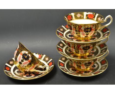 A set of four Royal Crown Derby 1128 Imari tea cups and saucers, Dublin low shaped, seconds, printed marks,(8)