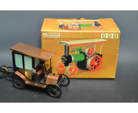 A Mamod TE1a Steam Tractor Engine, boxed with burner and fuel tablets;  an Italian motor car lamp (2)