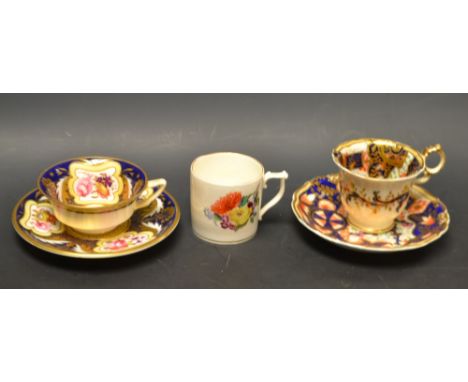 A Samson Hancock Derby cup, painted with flowers;  a H & R Daniel Etruscan shape cup and saucer, painted in coloured enamels 