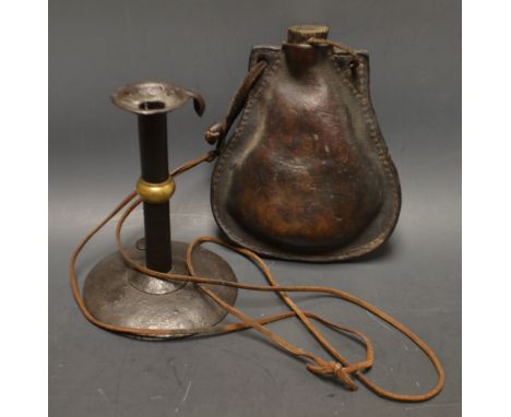 An early 19th century leather flask; an iron ejector candlestick