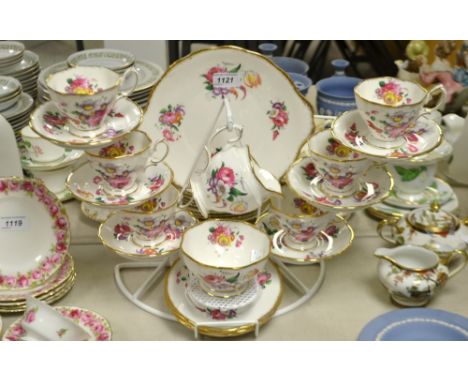 A Royal Albert Lady Angela pattern tea service for six, including cups,saucers, milk jug, sugar bowl, cake plate, printed mar