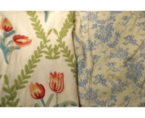 Textiles- a pair of cream background curtains decorated with roses, cherubs; crewel work panel, tulips and laurel on cream gr