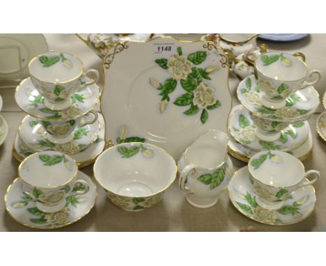 A Tuscan China Hawaiian Flowers Gardenia pattern six setting tea service, including bread plate, cups, saucers, milk jug etc,