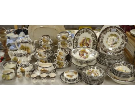 A Palissy Worcester Game Series table service including two tureens and covers, coffee pot, milk jug, sugar bowl assorted pla