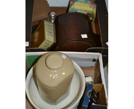 An oak 1940's mantel clock, tins, stoneware water bottle, smoking interest, etc.