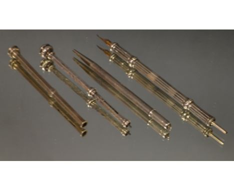 A silver ejector pencil;  another, similar, marked sterling;  two others, white metal (4)