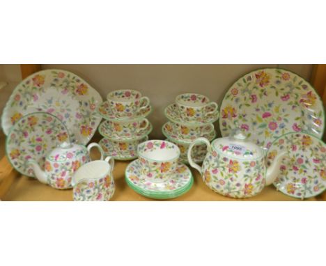 A Minton Haddon Hall six-setting tea service, comprising a teapot; another, smaller; bread plate; cake plate; cups, saucers a