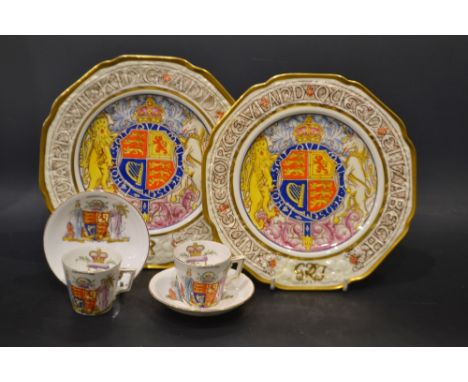 A pair of Paragon commemorative 1937 plate designed by J.A. Robinson; a pair of Wileman & Co Foley commemorative cups and sau