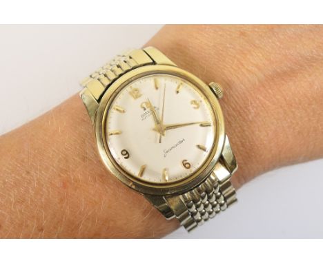 Omega Seamaster gent's gold plated wristwatch, circa 1964, 28mm champagne coloured dial, signed and with Arabic and baton num