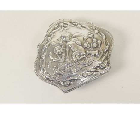 Continental silver snuff box, probably Dutch, shaped cushion form repousse decorated with a winged cherub attending a flower 