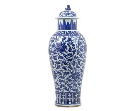 Chinese large blue and white vase and cover, 18th or 19th Century, the domed cover surmounted with a Dog of Fo finial, slende