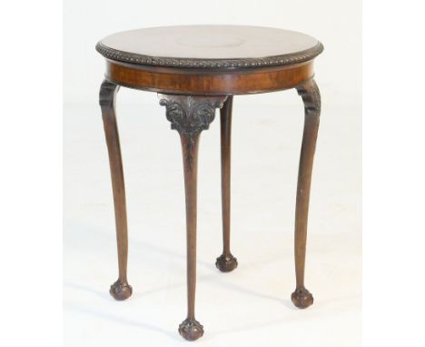 Late Victorian mahogany circular table in the Chippendale Revival style, having a gadrooned edge over acanthus carved slender