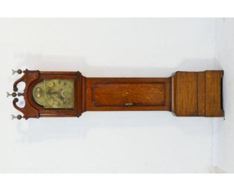 Oak eight day longcase clock by Richard Reader, Hull, having a brass 11 1/2ins arched dial with date aperture and subsidiary 