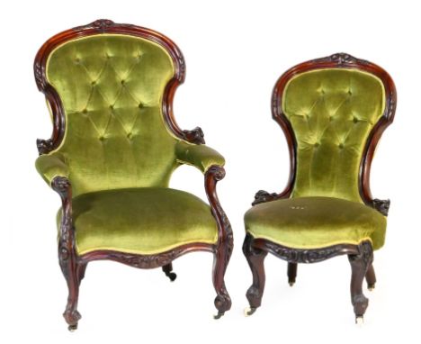 Victorian pair of mahogany and upholstered gentleman's and lady's salon chairs, circa 1860, each having carved and ogee mould