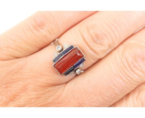 Art Deco fire opal, sapphire and diamond, cluster ring, the central rectangular cut fire opal flanked by four baguette sapphi