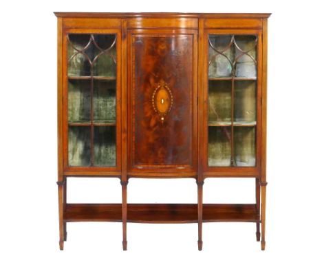 Late Victorian mahogany and inlaid bowfront display cabinet, circa 1890, crossbanded throughout in satinwood and with a centr