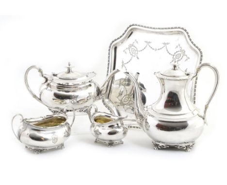 George V silver four piece tea and coffee service, maker SD Ltd, London 1910/17, comprising bombe shaped teapot, coffee pot, 