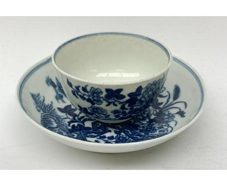 An 18th century Worcester porcelain half size tea bowl and saucer, each transfer print decorated in underglaze blue with the 
