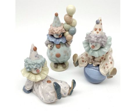 Three Lladro Clown figures: Littlest Clown, no.5811, Tired Friend, no.5812; and Having a Ball, no.5813 (3) - Condition Report