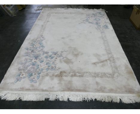 Cream and floral patterned rug with fringe, 250 cm x 166 cm 