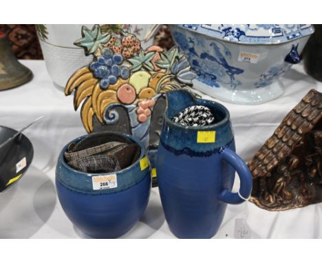 John o' Groats Pottery blue glazed jug and bowl, ceramic fruit sundae ornament and two flat caps 