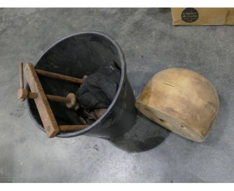 Bucket, metal press and hat block  