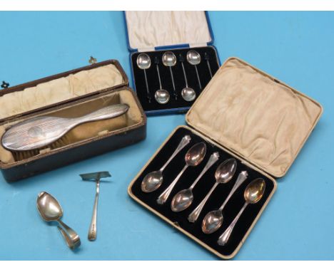 Two cased sets of silver coffee spoons, engine-turned silver hairbrush and comb, Birmingham 1928, and two other items 