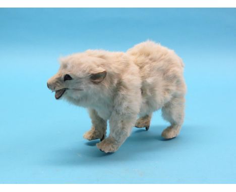 A late 19th century French polar bear automaton, probably Roullet et Descamps, skin-covered tin-plate with clockwork mechanis