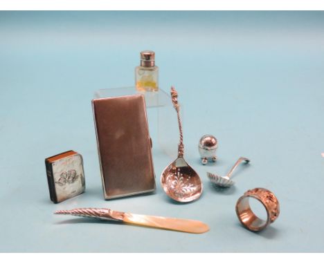 A Victorian silver apostle-top sifter spoon, London 1881, silver-mounted pearl paperknife, engine-turned silver combination c
